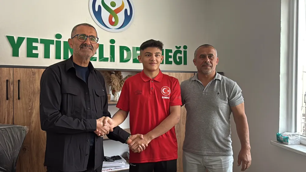 TÜRKİYE ŞAMPİYONU DOĞAN SABAZ’A ANLAMLI DESTEK YETİM ELLERDEN ALTIN ÖDÜL